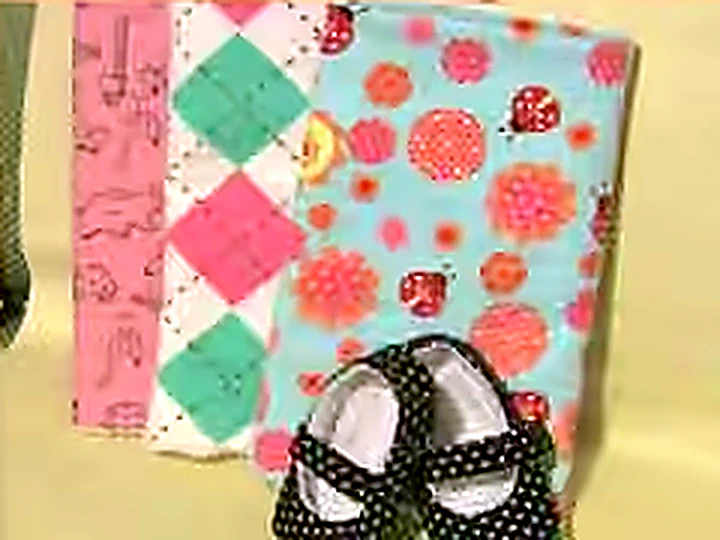 Kim's original handmade burp cloths and baby shoes